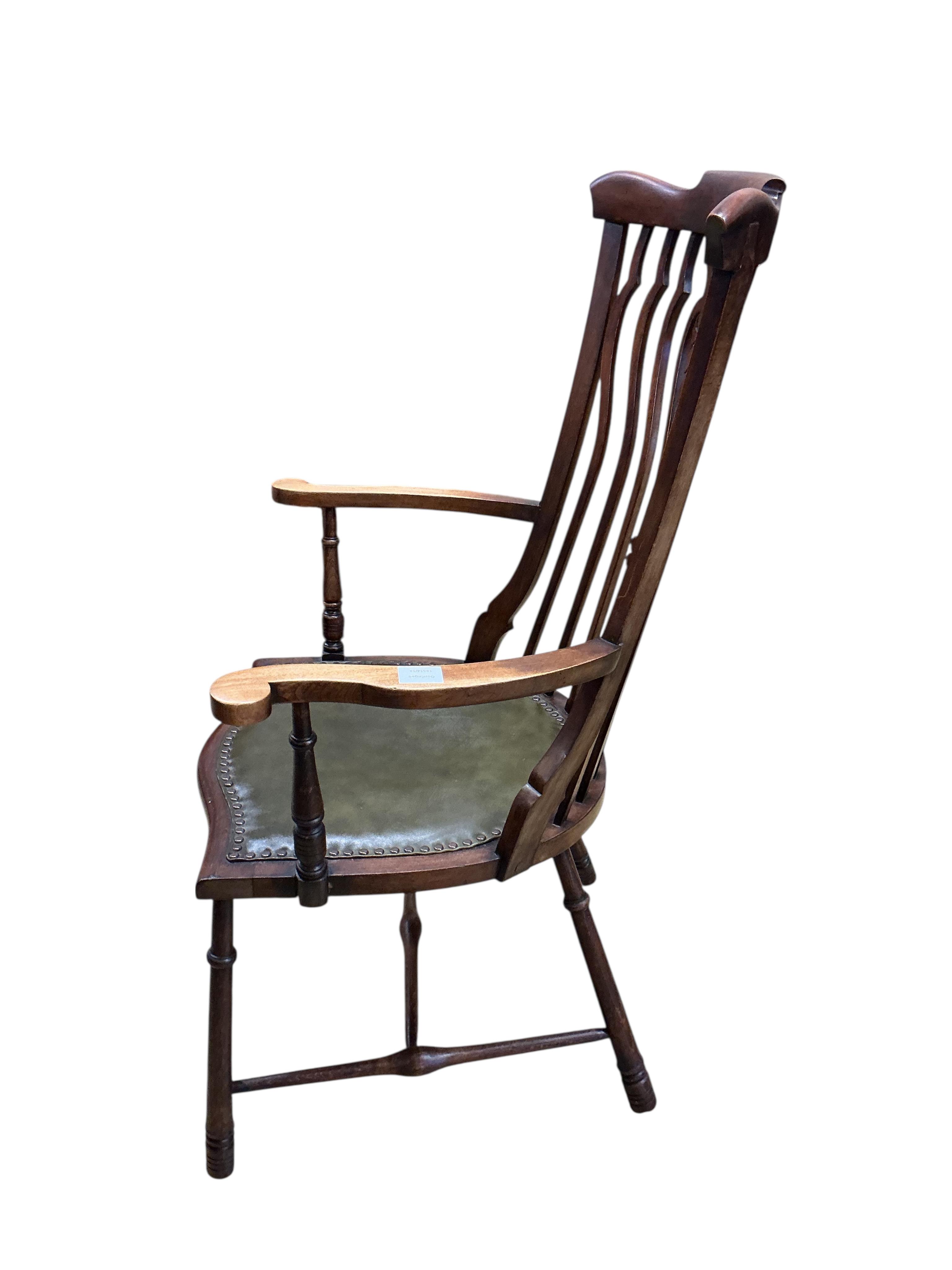 An early 20th century beech and mahogany Windsor armchair, width 67cm, depth 50cm, height 105cm